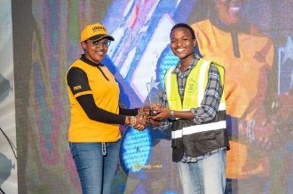 TechFab Hub team member receiving the innovation award on stage