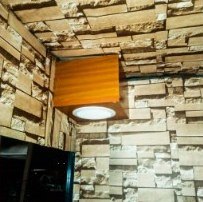Kiosk interior with Bluetooth speaker and ceiling light